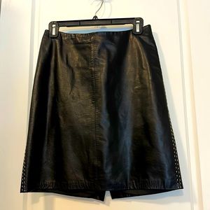 Ann Taylor size 2. 100% leather black mini skirt with stitching accent.